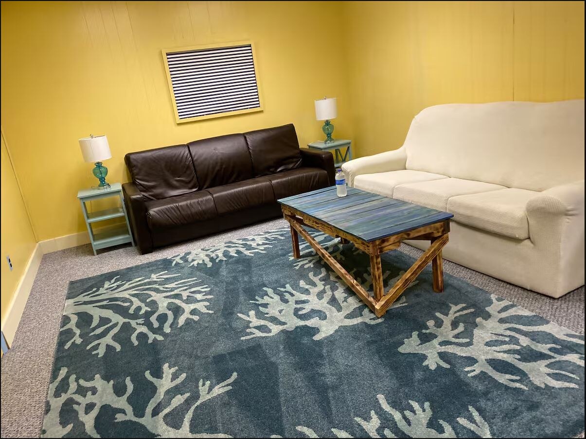 Coastal Apartment living room with ocean-inspired decor