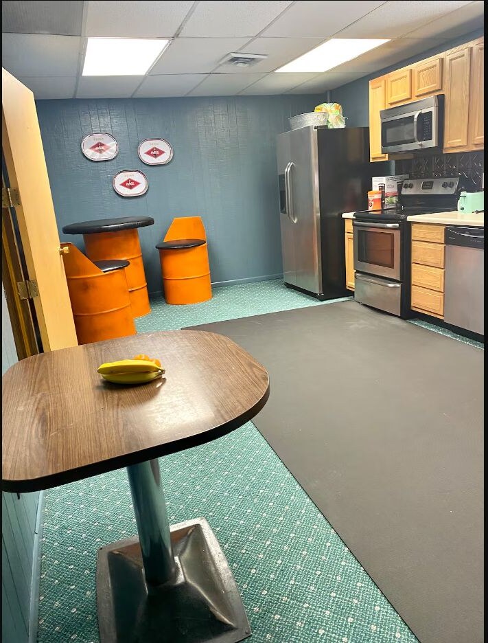 Full kitchen with wood cabinets and stainless appliances