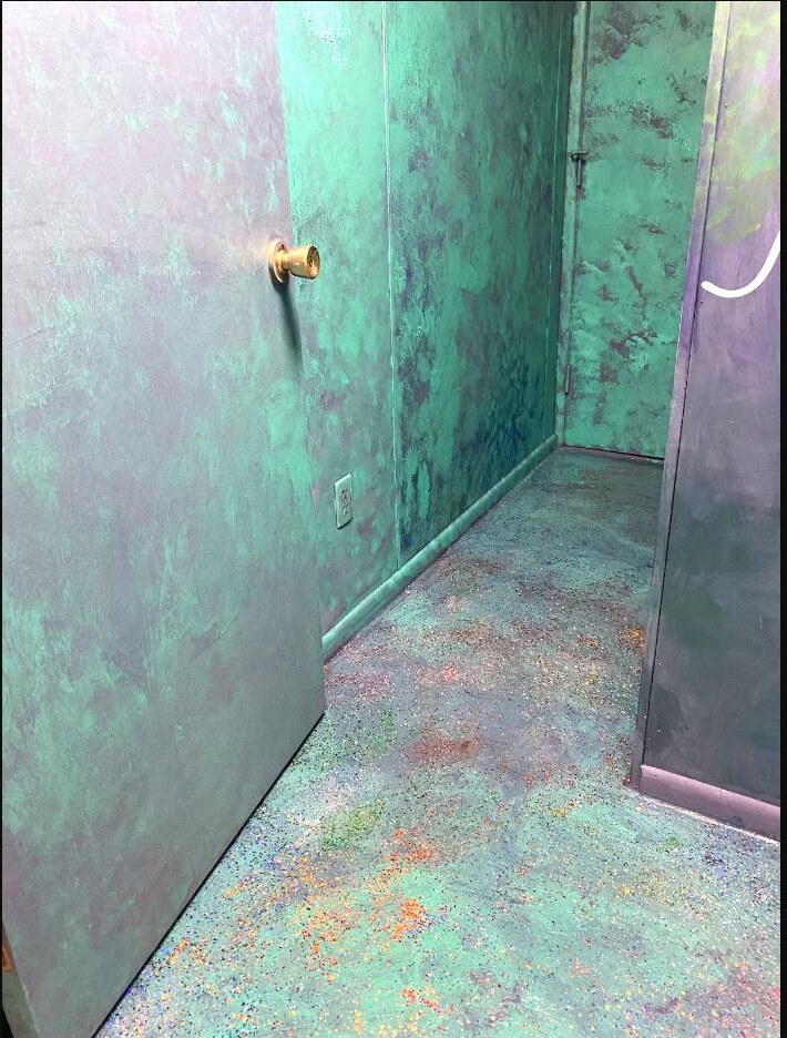 Hand painted ocean themed bathroom walls and floor