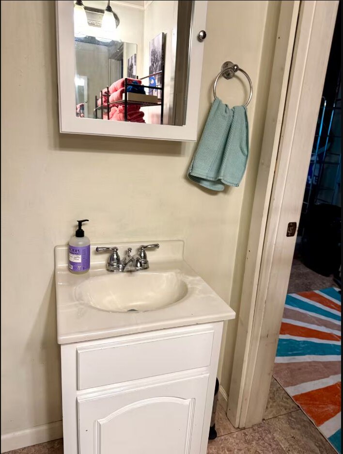 Bright bathroom vanity and mirror