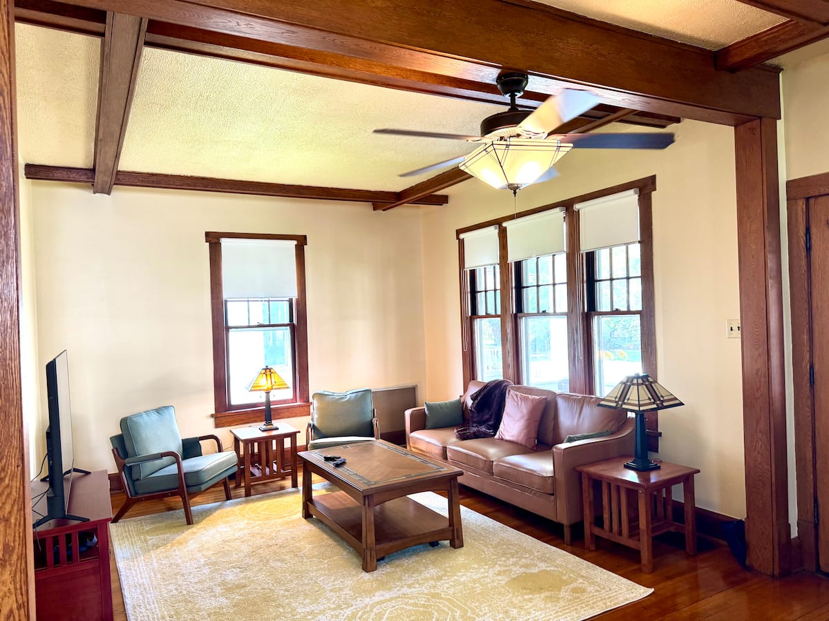 Double parlor with original wood trim and comfortable seating